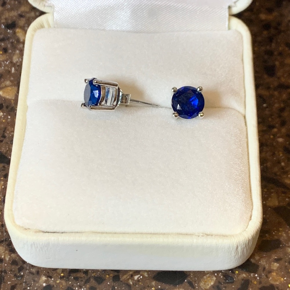 CRISLU blue stone studs prong set; silver plated; never worn; 1/4” diameter